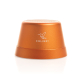 Haut-parleur compact cylindrique en finition métallique orange présenté de face sur fond neutre, avec marquage visible centré