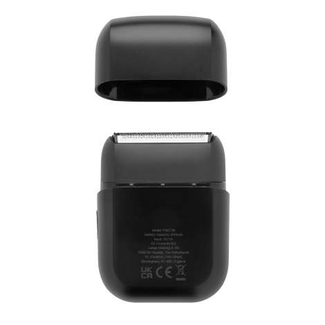 Rasoir ouvert avec capuchon au-dessus et marquages techniques visibles au dos, sur fond neutre, sans personnalisation visible