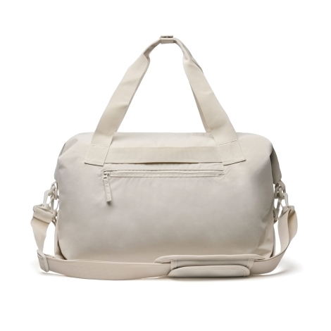 Sac de voyage beige présenté de dos avec poche zippée visible sur fond neutre, sans marquage apparent
