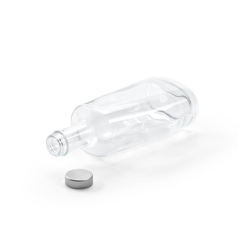 Bouteille en verre transparente couchée avec bouchon séparé à proximité montrant l’ouverture du col, sans marquage visible.
