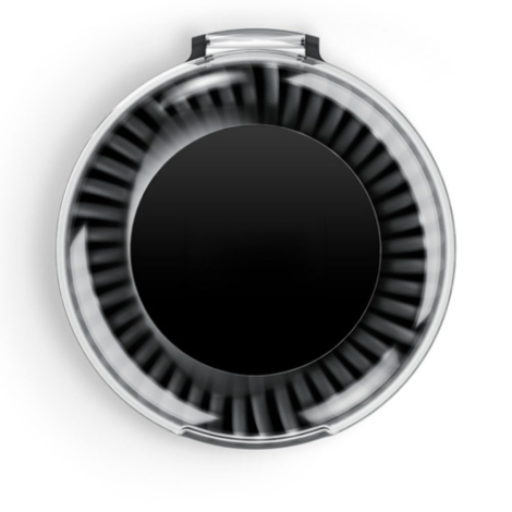 Vue de dessus d’un boîtier rond noir fermé mettant en avant la surface supérieure, sans marquage visible.