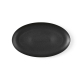 Vue de dessus d’un plat ovale en céramique noire, sans marquage visible.