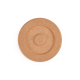 Vue de dessus d’un dessous de plat en liège avec anneaux concentriques, sans marquage visible.
