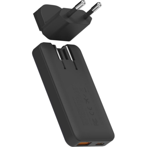Adaptateur secteur détaché au-dessus du chargeur montrant insertion, sans personnalisation apparente.
