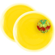 Deux disques jaunes avec balle à ventouses posée dessus, sans marquage visible Deux disques jaunes avec balle à ventouses posée dessus, sans marquage visible