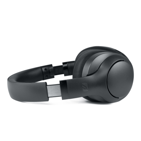 Vue de profil d’un casque Bluetooth noir avec arceau réglable apparent, présentée sans personnalisation visible.