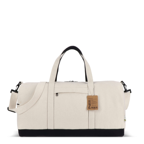 Sac de voyage beige présenté de profil avec étiquette produit apparente, sans marquage visible.