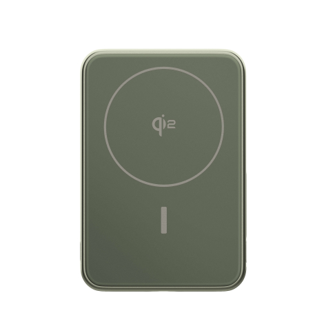 Vue arrière d’une batterie externe sans fil verte avec repère de charge magnétique visible, sans marquage apparent.