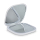 Miroir compact ouvert présenté sans personnalisation apparente. Miroir compact ouvert présenté sans personnalisation apparente.