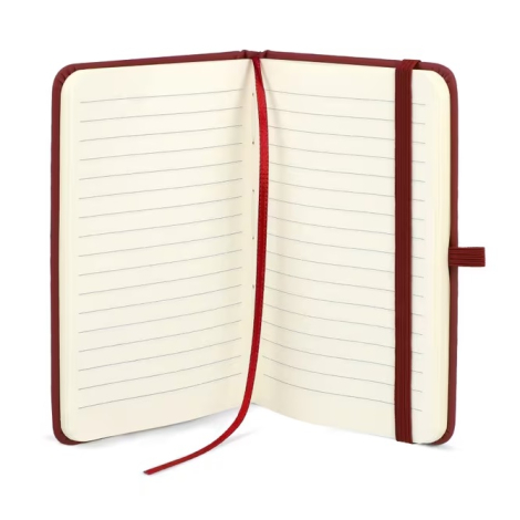 Carnet Sora A6 ouvert montrant les pages lignées, le ruban marque-page et la fermeture élastique, sans personnalisation visible.