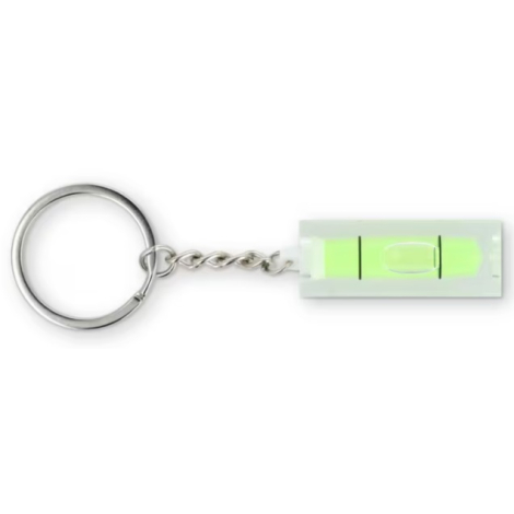 Porte-clés avec niveau à bulle présenté à plat, montrant la seconde face du bloc transparent sans personnalisation visible.