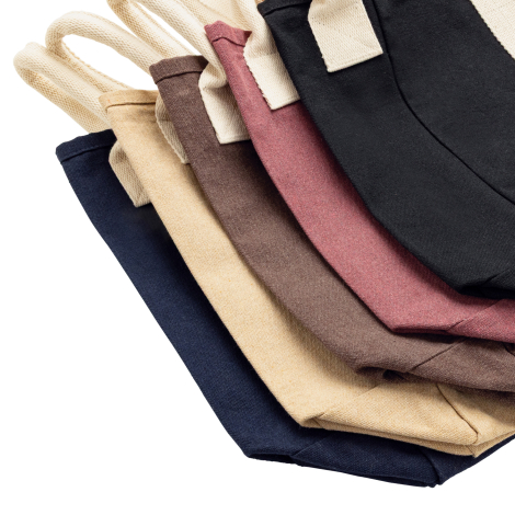 Présentation de plusieurs coloris du sac de plage alignés en vue de face.
