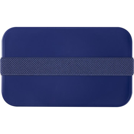 Gros plan sur la sangle élastique bleue maintenant le couvercle de la boîte à déjeuner.