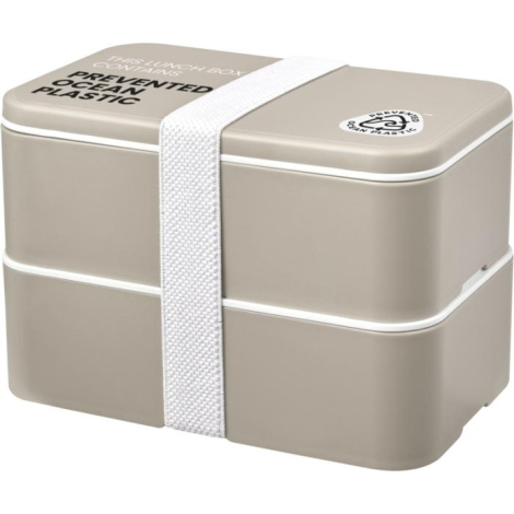 Boîte à lunch à double compartiment présentée fermée dans un coloris beige avec sangle élastique blanche, avec marquage visible 