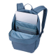Sac à dos bleu ouvert révélant plusieurs compartiments de rangement intérieurs et un espace dédié à un ordinateur portable, sans