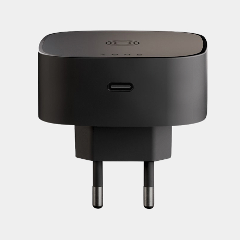 Adaptateur de charge sans fil présenté de face, mettant en évidence le port USB-C situé sur la face avant, sans marquage visible