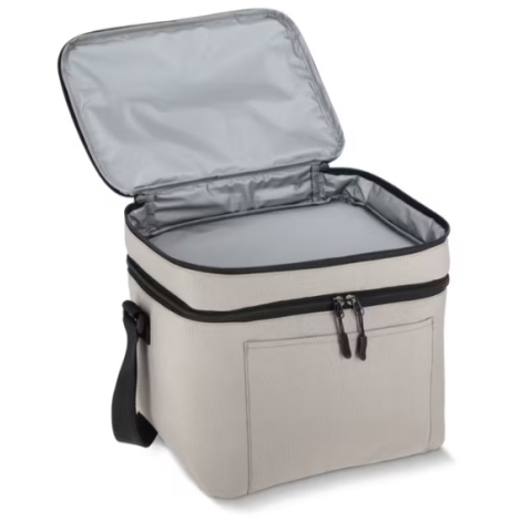 Sac isotherme à double compartiment ouvert montrant le compartiment supérieur avec sa doublure isotherme.