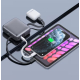 Powerbank connectée à un smartphone et à une tablette pour une recharge simultanée, sans personnalisation visible. Powerbank connectée à un smartphone et à une tablette pour une recharge simultanée, sans personnalisation visible.