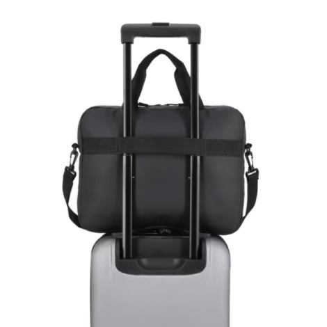 Sacoche pour ordinateur portable fixée sur la poignée télescopique d'une valise grâce à sa sangle de maintien arrière.