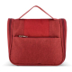 Vue de face de la trousse de toilette rouge, sans personnalisation visible. Vue de face de la trousse de toilette rouge, sans personnalisation visible.