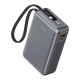 Batterie de secours grise au format compact, avec câble USB-C intégré en dragonne, indicateur numérique du niveau de charge et p Batterie de secours grise au format compact, avec câble USB-C intégré en dragonne, indicateur numérique du niveau de charge et p