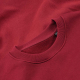 Gros plan sur le col rond et l'intérieur d'un sweat bordeaux, sans personnalisation visible. Gros plan sur le col rond et l'intérieur d'un sweat bordeaux, sans personnalisation visible.