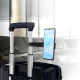 Support fixé sur la poignée télescopique d’une valise et maintenant un smartphone en position verticale, sans marquage visible. Support fixé sur la poignée télescopique d’une valise et maintenant un smartphone en position verticale, sans marquage visible.