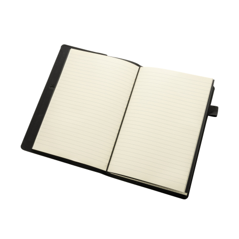 Organiseur noir ouvert avec un carnet à pages lignées installé à l’intérieur, entouré par la couverture et ses compartiments de 