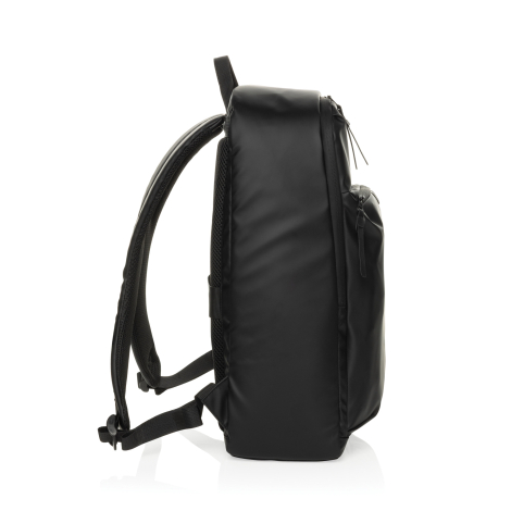 Vue de l’autre profil du sac à dos noir, avec poche frontale en relief, fermetures zippées et bretelles visibles à l’arrière.