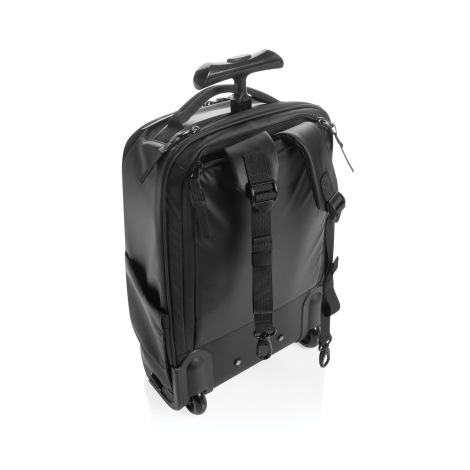 Vue arrière de trois quarts du sac à dos en configuration trolley, avec poignée télescopique sortie, bretelles rabattues et roul
