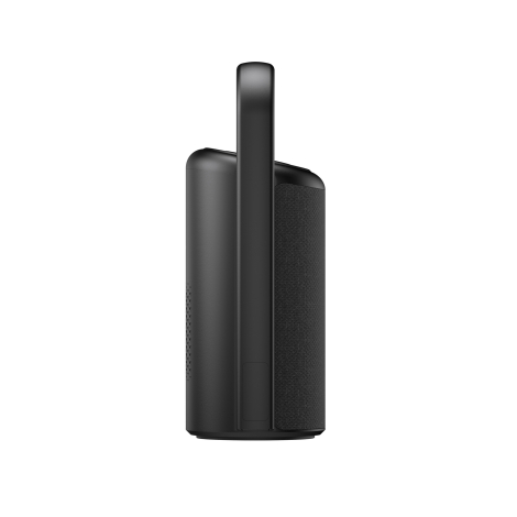 Vue latérale d’une enceinte portable noire mettant en évidence son boîtier compact, sa façade textile et la poignée verticale in