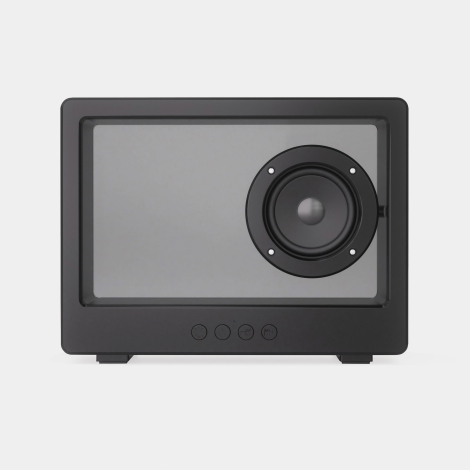 Vue de face d’une enceinte noire avec panneau translucide rectangulaire, haut-parleur circulaire placé à droite et quatre bouton