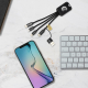 Câble 5-en-1 disposé sur un bureau à proximité d’un smartphone et d’un clavier, avec exemple de personnalisation blanche sur le Câble 5-en-1 disposé sur un bureau à proximité d’un smartphone et d’un clavier, avec exemple de personnalisation blanche sur le