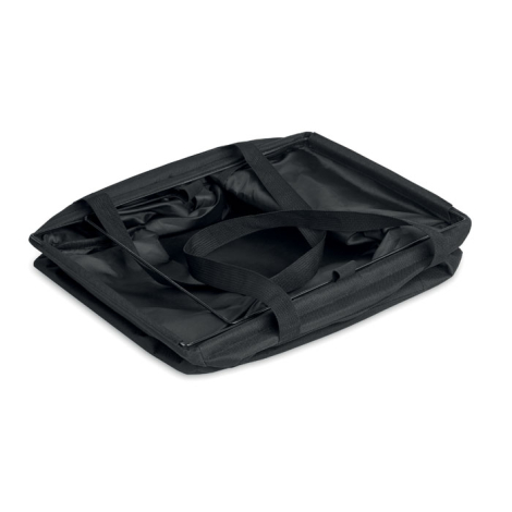 Le sac organiseur est entièrement replié à plat, ses parois souples et ses sangles étant rabattues sur l’ensemble.