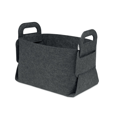 Le panier de rangement est présenté de trois quarts, avec grande ouverture supérieure, deux poignées découpées et larges parois 