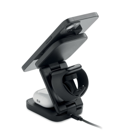 Vue arrière de la station noire en cours d’utilisation, avec smartphone fixé sur le support supérieur, montre connectée installé