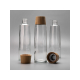 Bouteilles en verre transparent avec bouchons aspect bois présentés séparément. Bouteilles en verre transparent avec bouchons aspect bois présentés séparément.