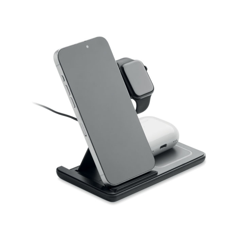 Station de charge noire avec un smartphone placé sur le support incliné, une montre connectée à l’arrière et un boîtier d’écoute