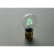 Ampoule décorative allumée dans une ambiance sombre, avec filament vert lumineux en forme de sapin. Ampoule décorative allumée dans une ambiance sombre, avec filament vert lumineux en forme de sapin.