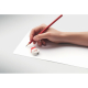 Crayon rouge utilisé pour écrire sur une feuille blanche, avec la gomme Père Noël détachée et posée à proximité. Crayon rouge utilisé pour écrire sur une feuille blanche, avec la gomme Père Noël détachée et posée à proximité.