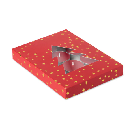 Vue en perspective d’une boîte cadeau rouge parsemée d’étoiles dorées, avec découpe en forme de sapin laissant apparaître plusie