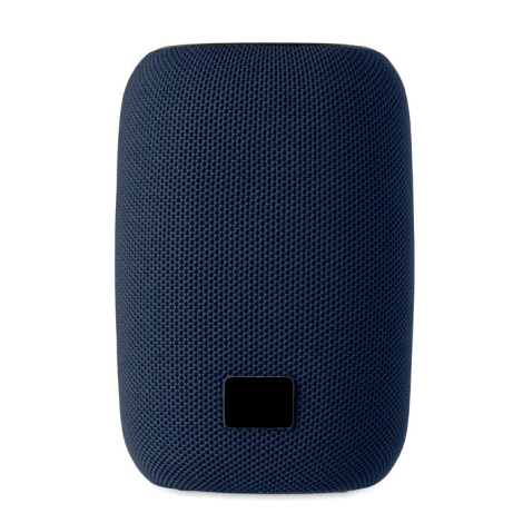 Vue de face du haut-parleur bleu recouvert de tissu, avec petite plaque rectangulaire noire dans la partie inférieure.