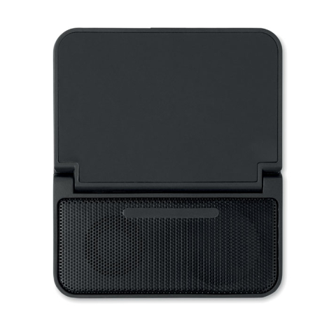 Vue de dessus de l’enceinte noire montrant le large support rectangulaire pour téléphone et la grille perforée avec élément hori