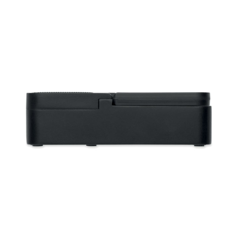 Vue latérale de l’enceinte noire avec support pour téléphone entièrement rabattu sur le dessus.