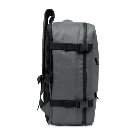 Vue de profil d’un sac à dos cabine gris montrant son épaisseur, les fermetures zippées et deux sangles de compression latérales
