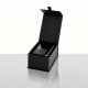 Mini-compresseur électrique portable noir présenté dans un coffret cadeau noir ouvert, avec écran éteint, commandes circulaires 