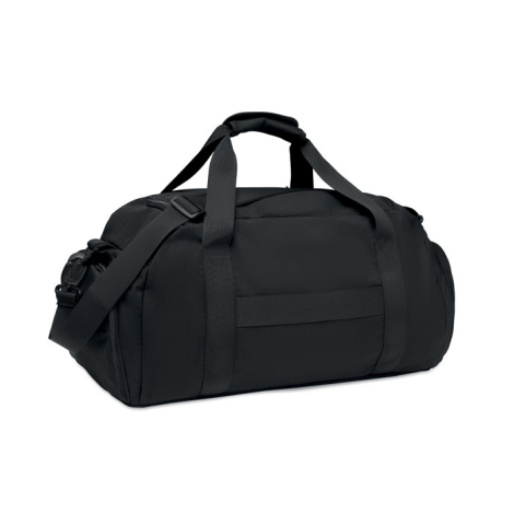Vue de trois quarts de l'arrière du sac de sport noir, montrant un passant horizontal pour trolley, une bandoulière amovible et 