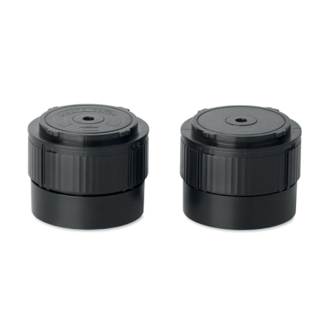 Deux vues rapprochées du module d'extraction noir de la machine à café portable, avec une partie supérieure circulaire et des pa