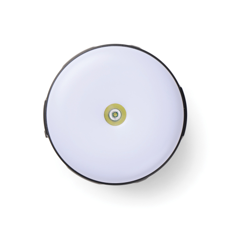 Vue de dessus du diffuseur circulaire blanc de la lanterne, avec une petite LED visible au centre.