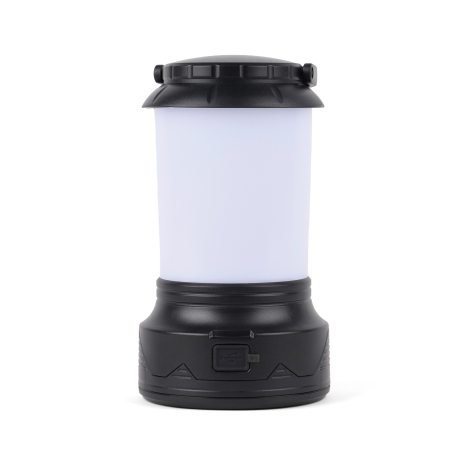 Vue arrière de la lanterne avec diffuseur blanc, anse rabattue et port USB protégé par un cache sur la base noire.